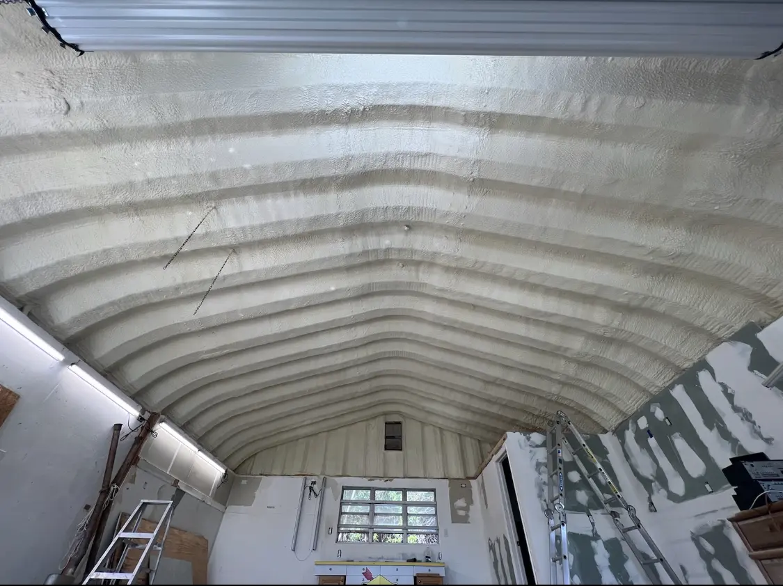 Spray polyurethane foam applied to the underside of a metal roof deck in Wallingford